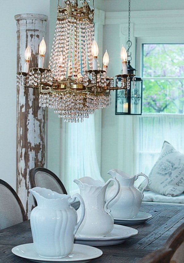 Farmhouse dining table and crystal chandelier....