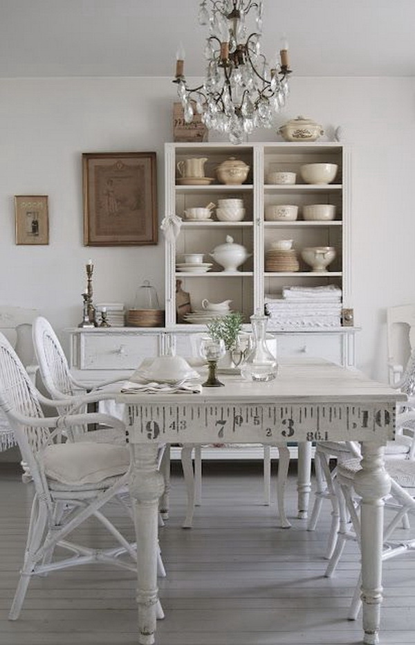 Simple white shabby chic dinning area with cabinets. 