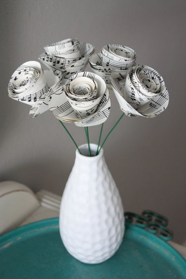 Large Paper Rose Flowers. These paper flower roses were handcrafted from repurposed sheet music or vintage old book pages.