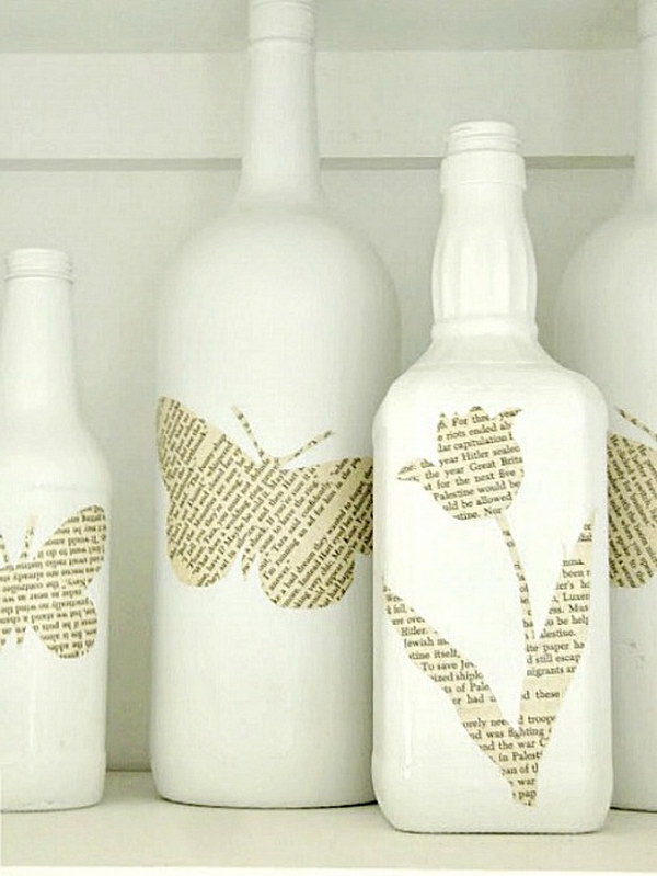Vintage Book Page Bottles. Beautifully crafted wine bottles adorned with delicate flowers, butterflies cut from old book pages!