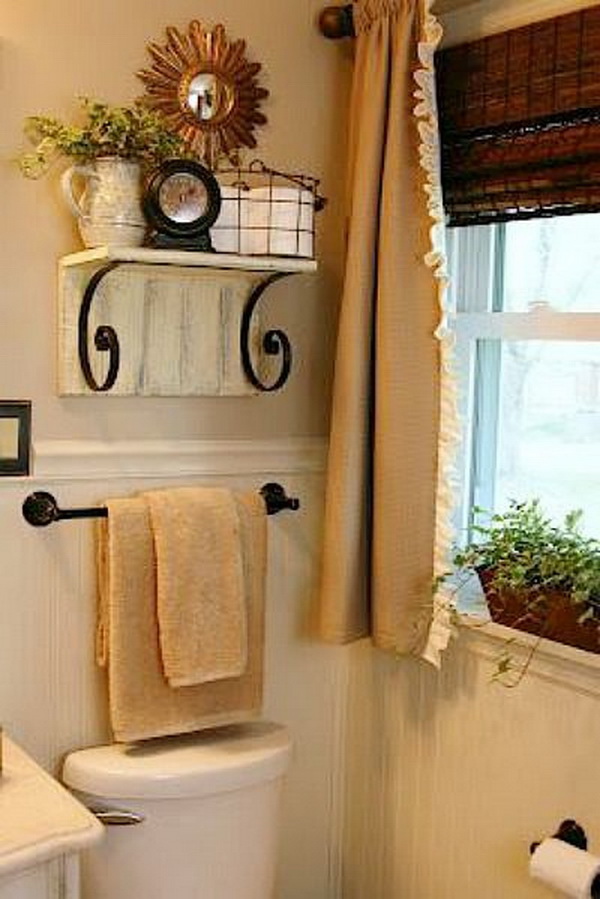 This vintage shelf with design allows you to utilize extra space for all your bathroom storage needs. 