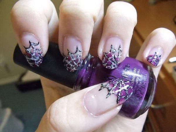 Glittery Purple Web Halloween Nail Art. 