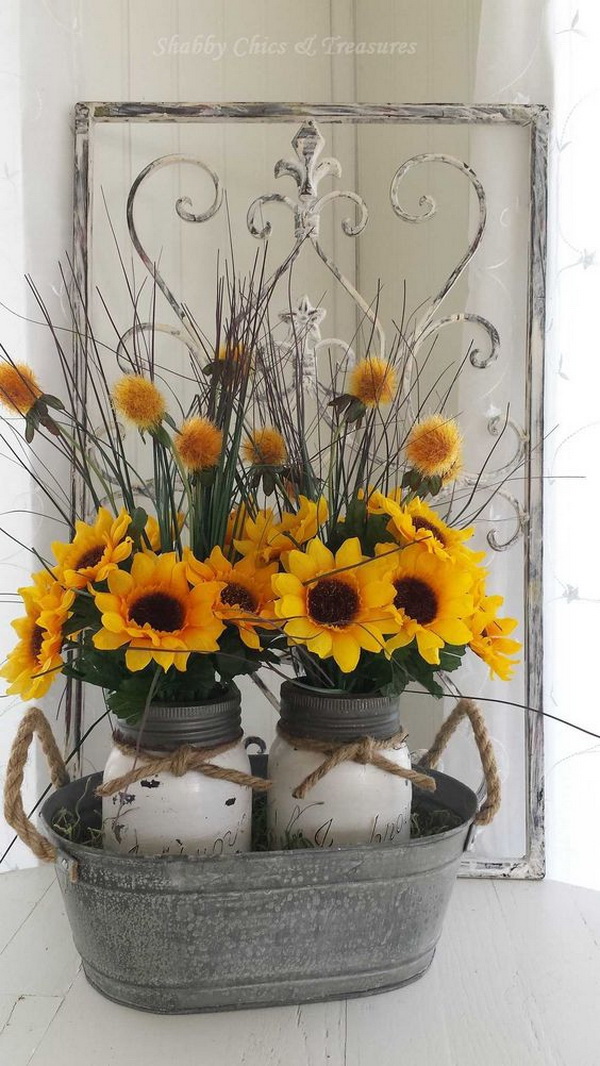 Sunflower Mason Jar Centerpieces. Paint two mason jars in white and lightly distressed and decorated with felt sunflowers with twine tied around the rim of the jar, then put them in a an old bucket. 