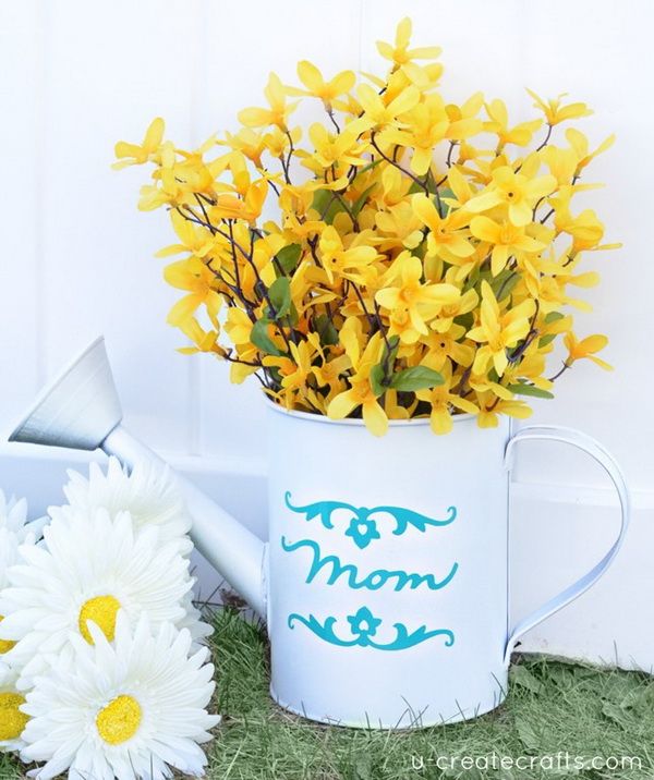 DIY Mothers Day Vase. Get a watering can and milk tin, spray painted it, and vinyled the words “Mom” and “Grandma” in their favorite colors and fill with fresh flowers! This will be a great gift for mom or grandmo who love to garden. 