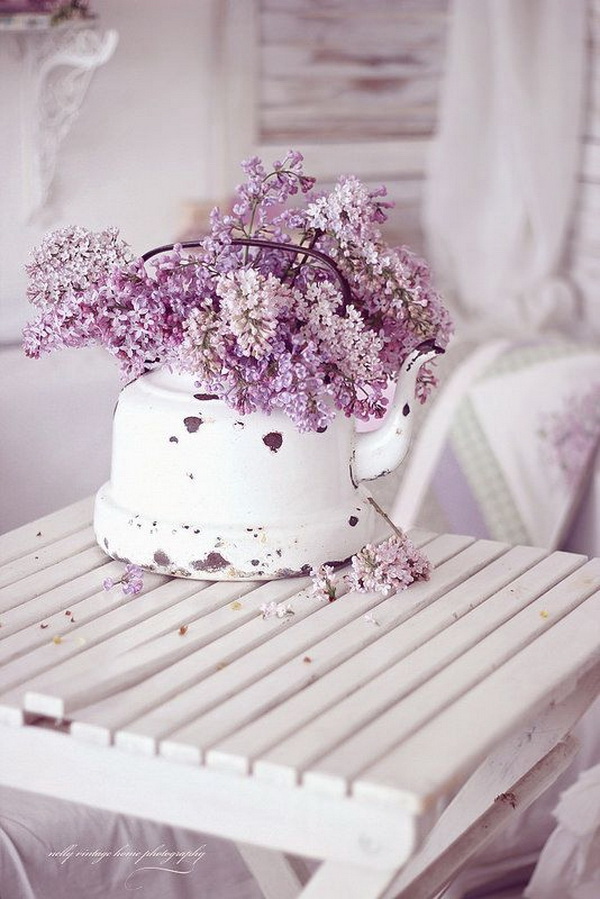 Purple Shabby Chic Look. Decorate with purple tones for a shabby-chic or comfortable cottage or country style. It is not very hard to do. Like putting a bunch of wild flowers in an old metal water jug for a simple but elegent decoration! It makes great centerpieces for your kitchen table, shabby chic weddings...