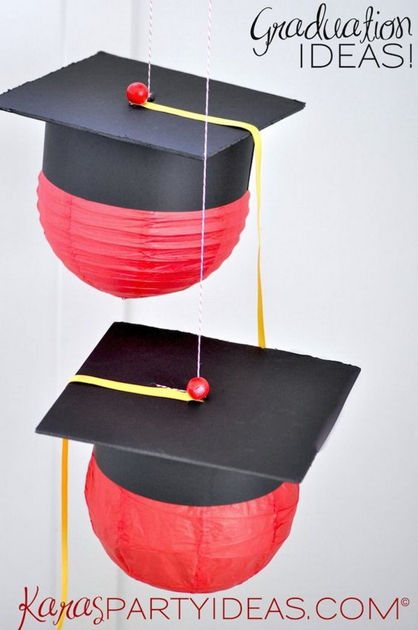 Graduation Cap Party Lanterns. Make these black graduation cap shaped hanging paper lanterns for your graduation decorations! This will be the perfect addition to your graduation party. 